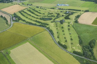 Oblique aerial view of Oldmeldrum Golf Course, looking NW.