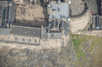 Oblique aerial view of Edinburgh Castle centred on the Great Hall, looking N.