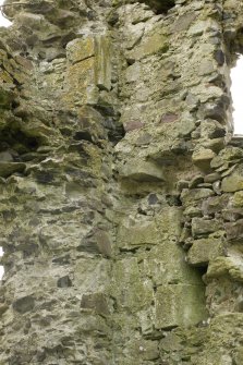 South east range, detail of stones with chamfer and stone with slot on inside of south west wall