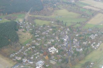Oblique aerial view of Strathpeffer, Easter Ross, looking N.
