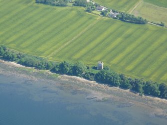 Near aerial view of Castle Craig and surroundings, S shore of Cromarty Firth, looking SE.