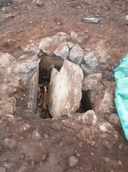 Archaeological excavation, Cist 1 on first inspection, Holm Mains Farm, Inverness, Highland