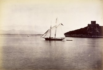 Oban, General.
General view of a sailing ship in Oban bay with Dunollie Castle and the Hills of Morven in the background.
Titled: 'Oban Bay - Dunolly Castle - Hills of Morven'.