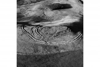 Woden Law, fort and associated monuments: air photograph under conditions of low light.
RCAHMS, 1994.
