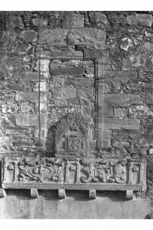 Brahan Castle. Detail of fragments of dormer pediment and fireplace lintel-detail of carved window pediment and window margin.