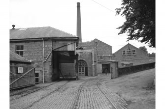 Peterculter, Paper Mill.
General view looking N-N-W showing entrance, chimney and North buildings.