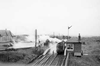 View from SE showing SSE front of signal box with locomotive in background