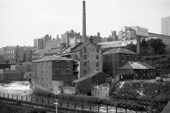 View from NW showing NNE and WNW fronts of mill with tool works on right
