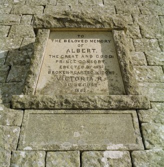Detail of carved memorial plaque on north west face