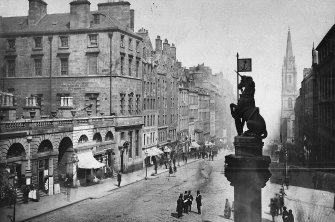 The unicorn atop the Mercat Cross with view from SW of High Street and City Chambers, Edinburgh. 1869
Photo montage.