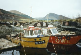 View with boats in foreground.