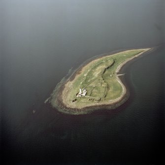 Oblique aerial view of Pladda centred on the lighthouse, taken from the SE.