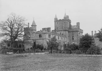 View of tower house and SW wing from SW.