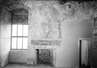 Interior.
View of painted E wall of S room including fireplace.