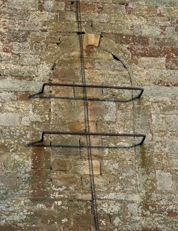 Fearn Abbey.  Detail of blocked window and bell chain on West gable.
