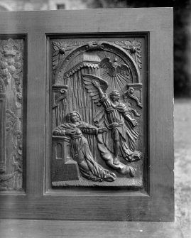 Interior.
Detail of carved panel on wooden seat.