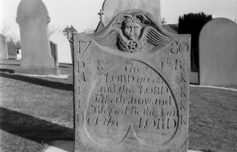 Detail of gravestone dated 1780 at St Regulus' burial ground, Monifieth.