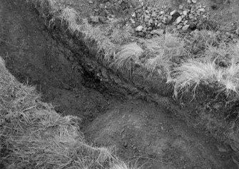 Woden Law, native fort and Roman investing works: excavation photograph.
I A Richmond: section of outer ditch of investing work. Undated.
