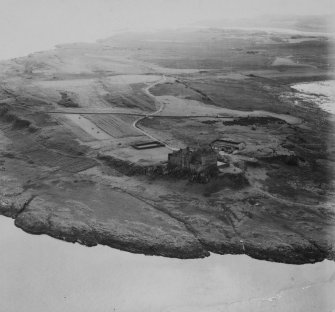 Duart Castle, Duart Point, Mull.  Oblique aerial photograph taken facing south.  This image has been produced from a print.