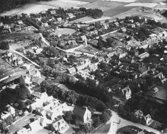 Kingussie, general view, showing High Street and Ardbroilach Road.  Oblique aerial photograph taken facing north-east.  This image has been produced from a print.
