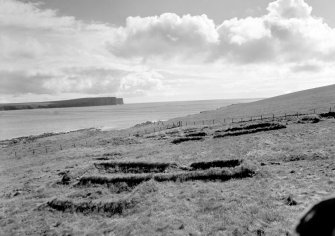 Markwick Head and isolated viking houses.