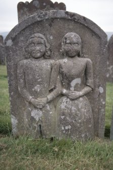 View of headstone  for Dolly Armstrong d. 1763 showing couple with arms linked,  Ettleton Cemetery