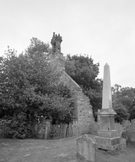 View from SW showing churchyard and belfry.