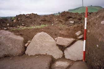 View of the NW corner of the excavation trench. Scale in 200mm divisions
