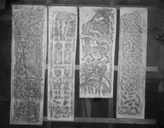 Photographic copy of four rubbings showing details of the Dupplin Cross, Monfieth no.4 cross shaft and the Rossie Priory Pictish cross slab.   
