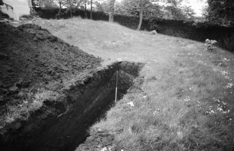 Excavation photograph : details of west facing section, trench D, looking east.