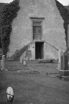 View of Kiltearn Parish Church showing stairs and door.