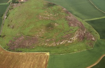 Oblique aerial view centred on the remains of the fort following the fire in 2003, taken from the W.