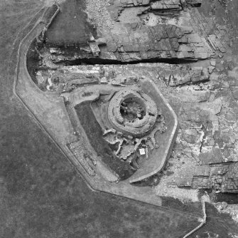 Oblique aerial view of Midhowe broch, Rousay.