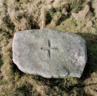 View of top of stone, showing incised cross