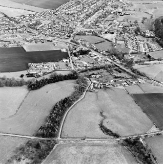 Oblique aerial view centred on the town, taken from the SW.