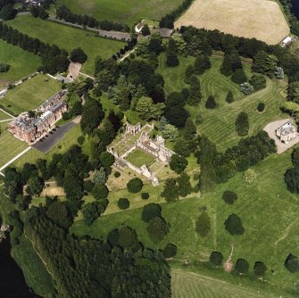 Dryburgh Abbey, oblique aerial view, taken from the SW, centred on the abbey, with Dryburgh House Hotel on the left-hand side of the photograph.
