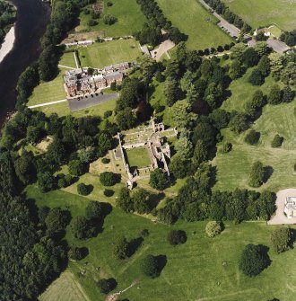 Dryburgh Abbey, oblique aerial view, taken from the S, centred on the abbey, with Dryburgh House Hotel in the top of the photograph.