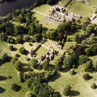 Dryburgh Abbey, oblique aerial view, taken from the SSE, centred on the abbey, with Dryburgh House Hotel in the top of the photograph.