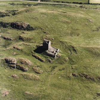 Oblique aerial view centred on the tower house, taken from the NW.