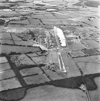 Oblique aerial view centred on power station from SE.