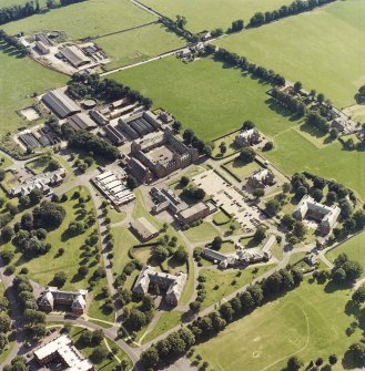 Oblique aerial view centred on the hospital, taken from the N.