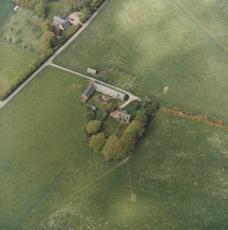 Oblique aerial view of the farmsteading, taken from the SE