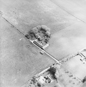 Oblique aerial view of the farmsteading, taken from the NW