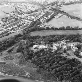 Oblique aerial view centred on Craig House, Old Craig House, South Craig Villa, Bevan House, East Craig and Queen's Craig, and part of Craiglockhart area of Edinburgh