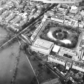 Oblique aerial view centred on the library with George Square and University buildings adjacent, taken from the SE.