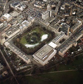 Oblique aerial view centred on the library with George Square and University buildings adjacent, taken from the SW.
