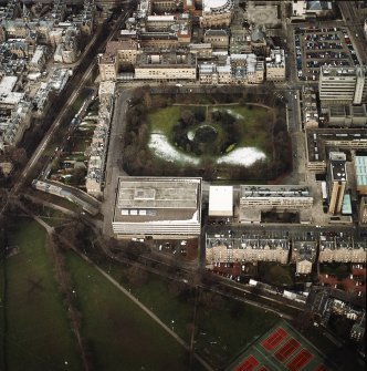 Oblique aerial view centred on the library with George Square and University buildings adjacent, taken from the SSE.