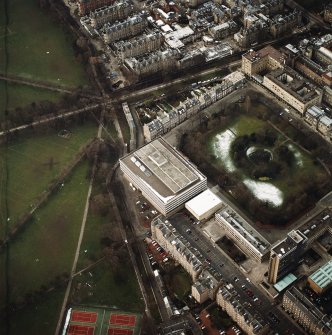 Oblique aerial view centred on the library with George Square and University buildings adjacent, taken from the ESE.