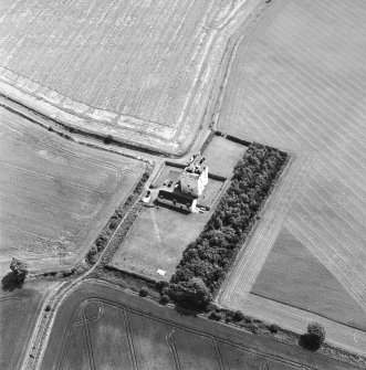 Obliqe aerial photograph centred on Falside Castle, taken from the NW.
