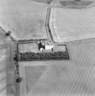 Oblique aerial photograph centred on Falside Castle, taken from the SW.